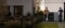Deux hommes debout devant une pompe à chaleur Viessmann à l'extérieur d'une maison